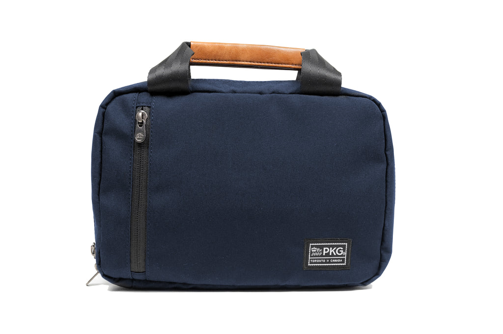PKG Simcoe accessory bag (navy) back view showing additional back pocket