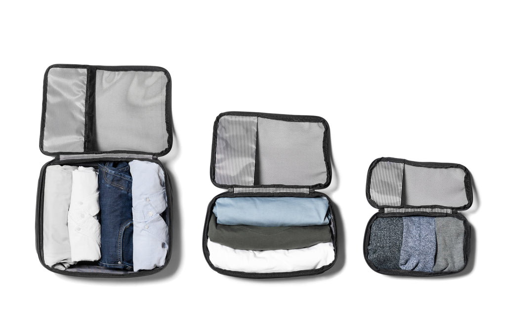 PKG Union Recycled Packing Cubes (3-pack) (black) all three cubes open with clothes inside